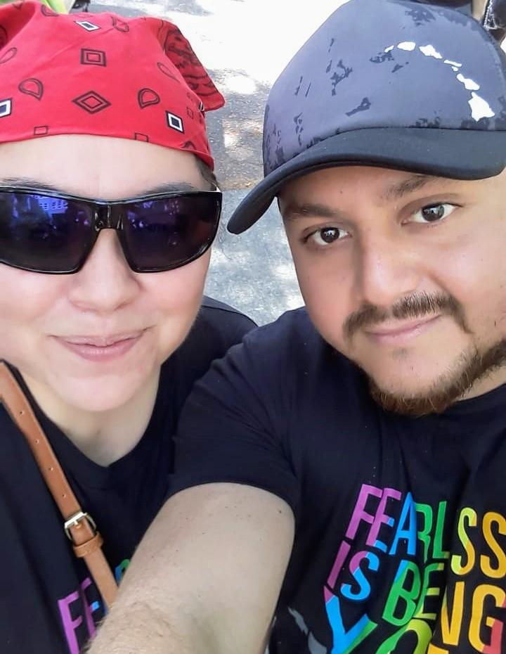 Photo of two people at the Pride parade