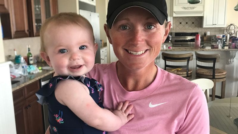 A woman holding a baby