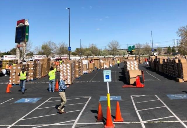 Volunteers in the parking lot of the Utah Food Bank