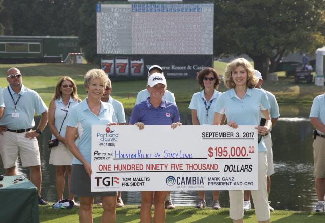 Group holding charity check