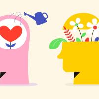 Two heads in a row one with flowers and one with a heart inside