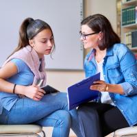 Teen talking to counselor