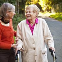 Image of two older women taking a walk