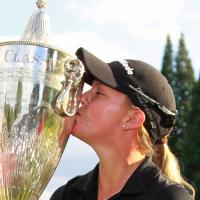 Kissing a trophy