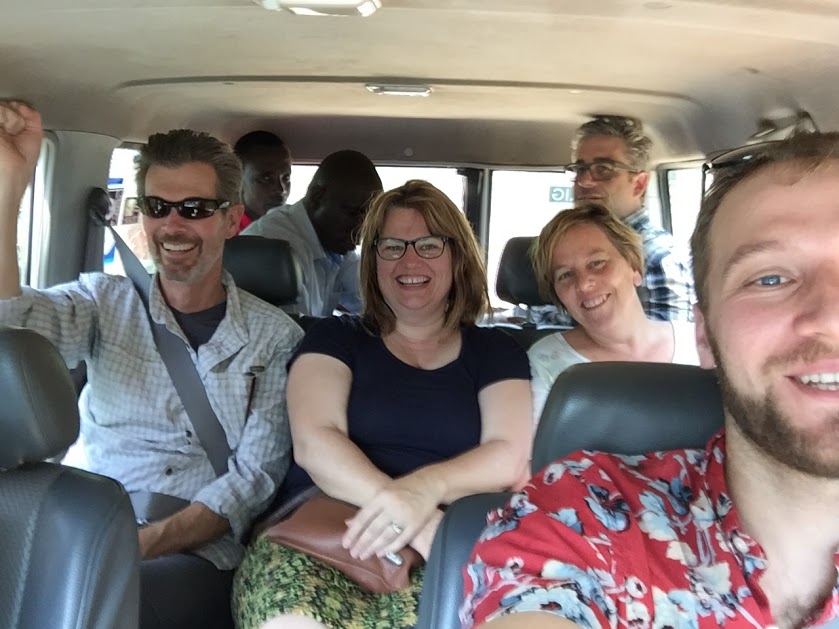 Cambia in Uganda, photo of several people in a car